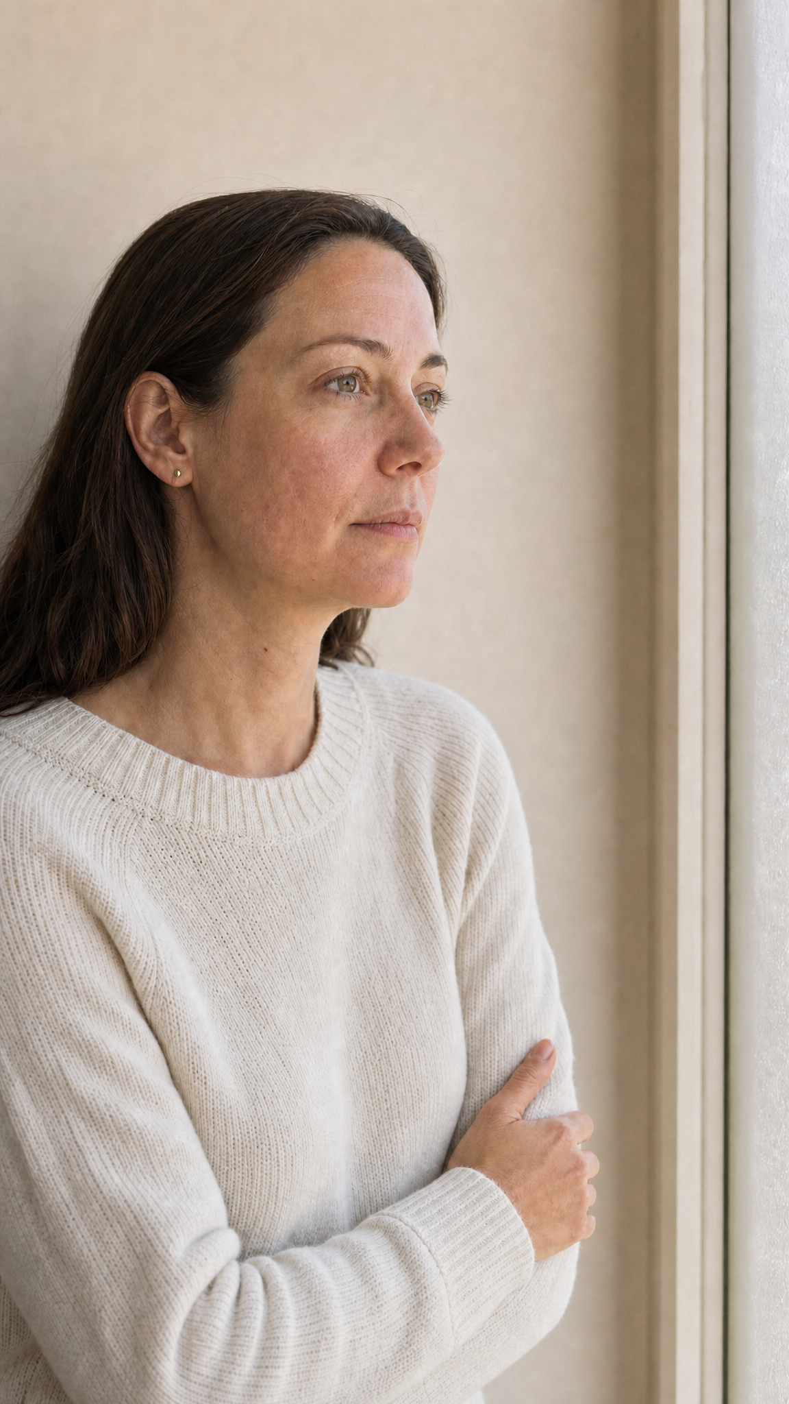 The same adult portrait shown with restrained annotation illustrating that a hollow, fold or softening should not automatically be interpreted as volume loss.